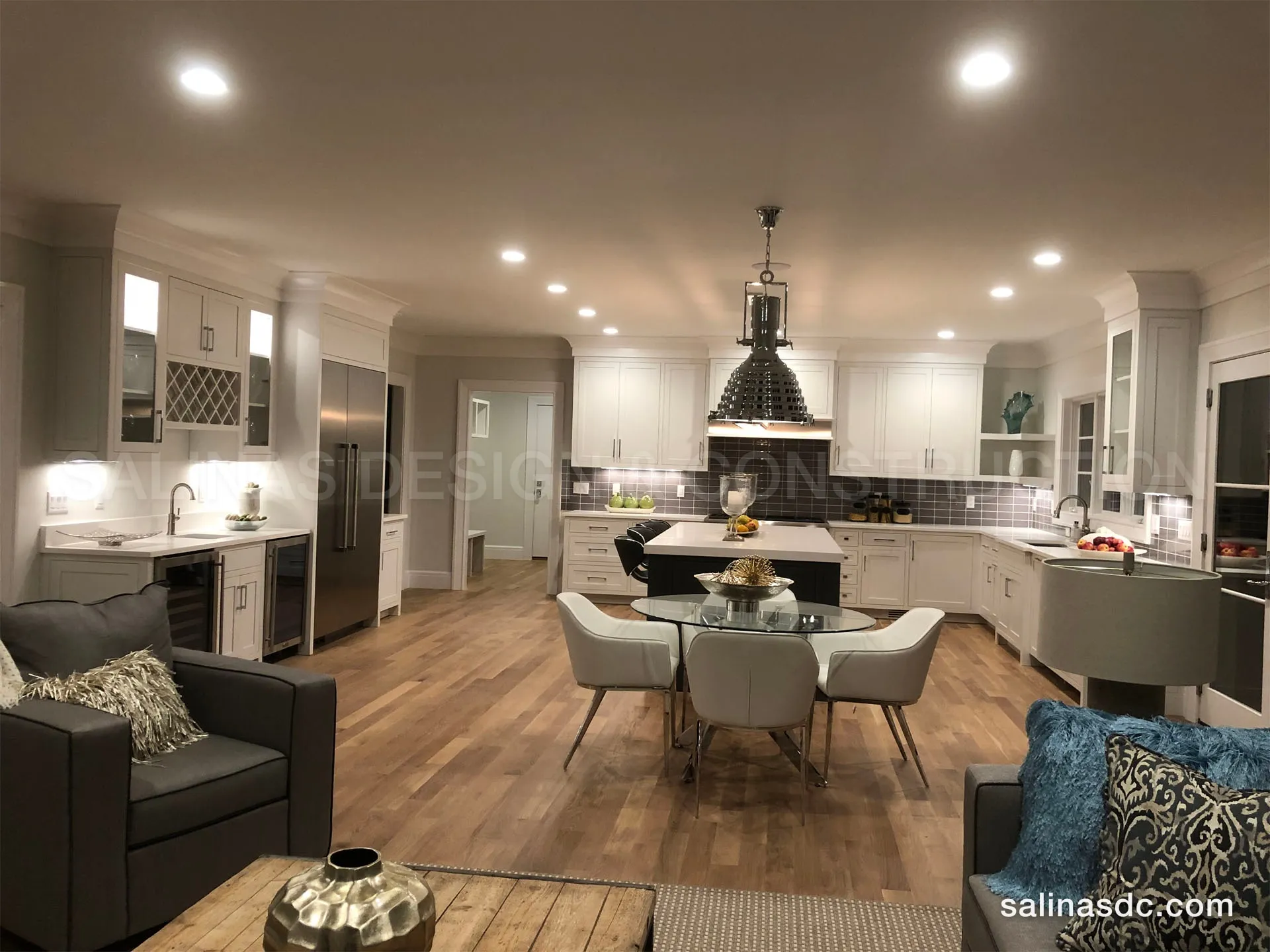 Open plan kitchen with custom white cabinetry and island in Westport, Connecticut
